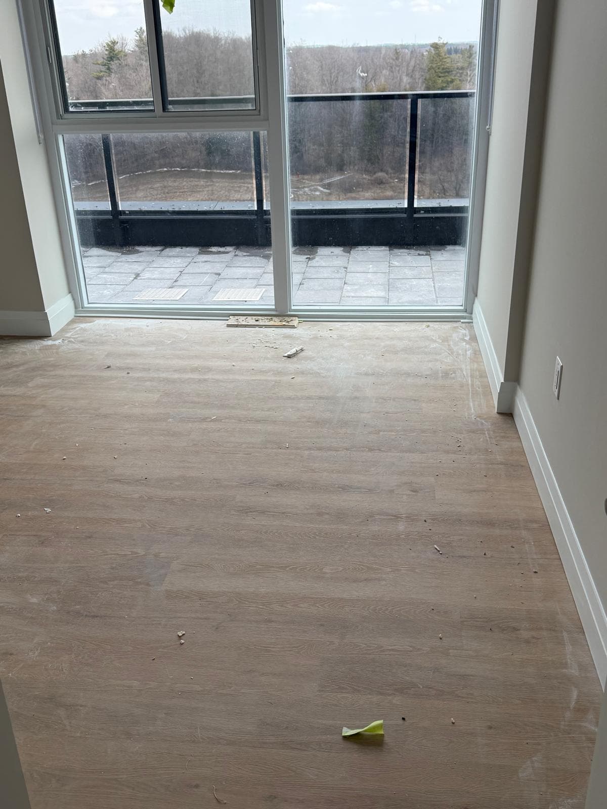 Spotless suite with floor-to-ceiling windows ready for pre-delivery inspection at Tricar Guelph